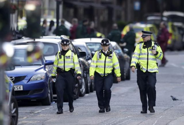 londonska policija Foto: AP Photo/Heng Sinith