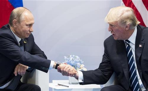 Putin i Tramp Foto: Tanjug/ AP Photo/Marcellus Stein