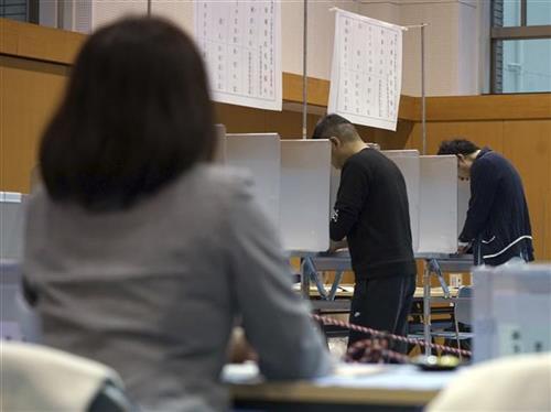 Parlamentarni izbori u Japanu Foto: AP Photo/Eugene Hoshiko