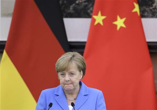 Merkel u Kini Foto: Jason Lee/Pool Photo via AP