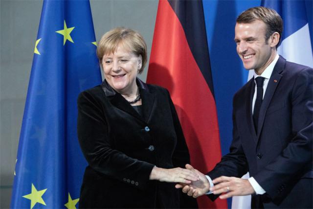 Merkel i Makron/EPA/OMER MESSINGER