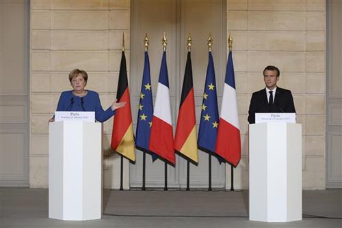 Merkel  i Makron Foto: Ludovic Marin/Pool photo via AP